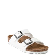 Get down with the truest, most choice slide sandal around! The Birkenstock Arizona features a Birko-Flor® faux nubuck upper and an anatomically correct cork footbed molded to the contours of your foot, promoting comfort, balance, and support. Inc Comfortable White Slides With Leather Footbed, White Cork Sandals For Spring, Casual Cork Slides With Arch Support, Casual White Cork Sandals, Casual White Slides With Cork-bed Midsoles, Classic White Footbed Sandals With Cork-bed Midsoles, Comfortable White Slides With Cork-bed Midsoles, Birkenstock White Sandals, Baby Birkenstocks