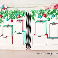 an open planner with christmas decorations on it