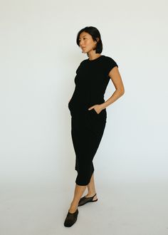 Simple but stylish, classic and cool - The Origin Dress is a timeless, ribbed midi dress that you can throw on with ease. Wear it casually, add a jacket or dress it up, The Origin Dress can do it all. Fitted Solid Midi Dress For Loungewear, Relaxed Fit Linen Midi Dress For Work, Casual Everyday Midi Dress, Casual Everyday Ribbed Dresses, Sleek Ribbed Midi Dress, Black Relaxed Fit Midi Dress, Casual Midi Dress For Everyday, Ribbed Stretch Midi Dress For Work, Everyday Stretch Midi Dress