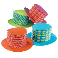 four different colored hats are stacked on top of each other in the shape of circles