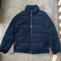 Brand New, Never Worn, Tag Still On Blue Corduroy Long Sleeve Outerwear, Blue Corduroy Outerwear For Spring, Blue Long Sleeve Corduroy Outerwear, Levi's Blue Outerwear For Fall, Blue Corduroy Outerwear For Fall, Fitted Casual Blue Puffer Jacket, Fitted Blue Casual Puffer Jacket, Levi's Blue Outerwear With Pockets, Casual Navy Puffer Jacket With Long Sleeves