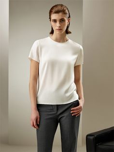 This crewneck short-sleeve T-shirt is a timeless must-have piece. Crafted from 100%. natural silk fabric, it is slightly stretchy, perfectly figure-hugging, and comfy to wear. It is suitable for all seasons and designated for your casual athleisure looks. Silk Double Joe Classic Stretch T-shirt For Workwear, Classic Stretch Top With Short Sleeves, Sleek Crew Neck Tops For Workwear, Sleek Crew Neck Tops For Work, Classic Fitted Short Sleeve Top In Solid Color, Elegant Spring Workwear T-shirt, Classic Fitted Short Sleeve Top For Summer, Elegant Fitted Tops With Cap Sleeves, Chic Fitted T-shirt For Work