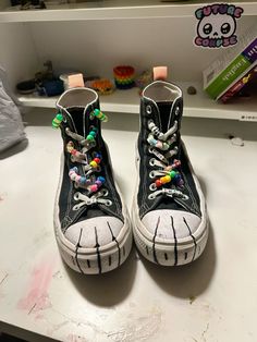 i luv these sm!!!! i made the majority of the little doodles in class or clubs so there are memories :3 Shoe Lace Decoration, Doodling On Shoes, Converse Shoes Decorated, Shoe Ideas For School, Paw Shoes Converse Therian, What To Draw On Converse, Therian Converse, Writing On Converse