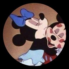 an image of mickey and minnie mouse dancing