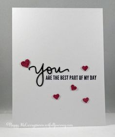 a white card with red hearts and the words you are the best part of my day