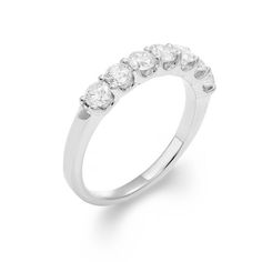 a white gold ring with five stones on the side and four diamonds in the middle