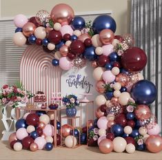 a birthday party with balloons and decorations