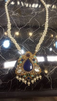 Kundan mala nackless with beautiful perls mala gold plated broch with kundan and stone available size in 18inches 22inches 26inches and available as pur customer required length. Kundan Mala, Pearl Necklace, Statement Necklace, Gold Plate, Plating, Stone, Gold