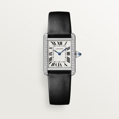 Cartier - Tank Must watch - Watch Woman Steel/Leather - Tank Must watch, small model, high autonomy quartz movement. Steel case, bezel set with 40 brilliant-cut diamonds totaling 0.39 carats, beaded crown set with a synthetic cabochon-shaped spinel, silvered dial, blued-steel sword-shaped hands, interchangeable black brushed calfskin strap, steel ardillon buckle. Case dimensions: 27 mm x 22 mm, thickness: 6.6 mm. Water-resistant up to 3 bar (approx. 30 meters/100 feet). Cartier Tank Must Watch Woman, Tank Must Watch, Cartier Tank Must, Pasha De Cartier, Beaded Crown, Tank Watch, Cartier Panthere, Cartier Tank, Cartier Watch