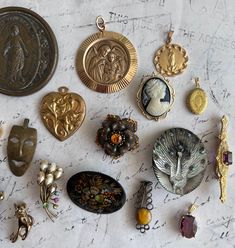 Beautiful Antique French jewelry broches pendants lockets choose your charms from this set of 17, 17 beautiful unique jewelry piece pendants medailles broches locket charm ornamental art nouveau french german spanish italian dutch, choose your charms by numer from the drop-down menu, the numbers are on the photo's! Worldwide shipping within two weeks Antique Jeweled Brooches For Gifts, Antique Jeweled Pendant Brooches, Antique Brooches With Vintage Charm As Gift, Antique Brooches With Vintage Charm For Gifts, Vintage Pendant Locket Brooch, Vintage Locket Pendant Brooch, Victorian Brooch For Jewelry Collecting, Victorian Brooch For Collecting, Vintage Medallion Brooch Jewelry