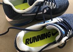 the running shoe is blue and yellow