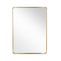 a gold framed mirror on a white background