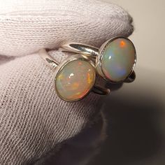 Ethiopian opal ring 925 silver,silver opal ring,Ethiopian opal,genuine opal ring, solid opal ring,handmade opal ring,Natural opal rings We accept Costume orders available in all ring sizes Luxury Handmade Ethiopian Opal Ring, Handmade Opal Promise Ring, Handmade Open Opal Ring, Adjustable Opal Ring, Cabochon Opal Round Rings, Opal Cabochon Round Rings, Silver Ethiopian Opal Rings As A Gift, Silver Ethiopian Opal Ring For Promise, Handmade Silver Rings With Ethiopian Opal