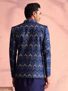 SHRESTHA By VASTRAMAY Men's Navy Blue Silk Embroidered Jodhpuri Look dapper in this classic navy blue silk Jodhpuri set. It features a beautifully embroidered jacket with a zig-zag pattern and sequins, paired with a comfortable kurta and pants. Perfect for special occasions. Key Features Navy blue silk Jodhpuri set Embroidered jacket with zig-zag pattern and sequins Mandarin collar kurta with side pockets Full sleeves, above knee length Navy blue solid pants with elasticated waistband Specificat Kurta And Pants, Collar Kurta, Looking Dapper, Zig Zag Pattern, Blue Solid, Embroidered Jacket, Blue Silk, Full Sleeves, Mens Navy