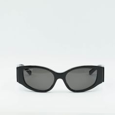 Welcome to OSSA FRAMES, where luxury meets style with the Balenciaga BB0258S 001 Black/Grey sunglasses. These chic and sophisticated shades are the perfect accessory for any fashion-forward woman looking to make a statement. The Balenciaga BB0258S features a sleek black acetate frame that exudes elegance and class. The cat eye style adds a touch of drama and glamour to any outfit, making these sunglasses perfect for a day out on the town or a night on the town. The grey lenses provide a subtle pop of color and offer 100% UV protection, ensuring your eyes stay safe and stylish in the sun. With a lens socket width of 58, these sunglasses are designed to fit comfortably on most face shapes. The temple length of 145 and bridge size of 18 ensure a secure and snug fit, so you can wear them all d Chic Formal Shield Sunglasses With Tinted Lenses, Modern Sunglasses With Tinted Lenses For Evening, Modern Evening Sunglasses With Tinted Lenses, Modern Tinted Sunglasses For Evening, Chic Formal Shield Sunglasses With Uv Protection, Designer Shield Sunglasses With Tinted Lenses For Evening, Chic Polarized Shield Sunglasses For Evening, Designer Tinted Shield Sunglasses For Evening, Sleek Polarized Sunglasses For Evening