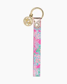 a keychain with a flower design on it