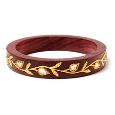 22k Gold, carved wood bangle with Uncut Diamonds. Each bangle sold individually. Please note that our fine jewelry items are final sale. We encourage you to visit our showroom in NoHo, New York City, to view these pieces in person. Please call us at (212) 869-3434 and we will be happy to answer any questions you may have. Materials: 22k and Uncut Diamond 1.2 ctMeasurements: Inner Diameter 2.6" x Width 0.25" (Size 8)Allergy Information: Hypoallergenic Jaipur Jewelry, Bengali Bride, Exotic Jewelry, Jewelry Magazine, Gold Earrings Wedding, Jewelry Designing, Gold Jewelry Simple Necklace, Antique Jewelry Indian, Amrita Singh