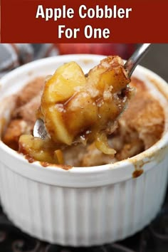 an apple cobbler for one in a white bowl with the title overlay above it