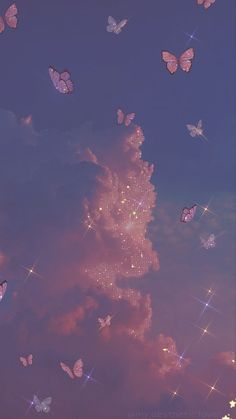 there are many pink butterflies flying in the sky with stars on them and some clouds