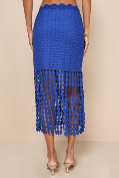 Get ready to make waves in any tropical destination when you wear the Lulus Getaway Icon Royal Blue Textured Fringe Midi Skirt! This statement-making skirt is composed of unique textured fabric and has a high waist (with a medallion-like crocheted belt-inspired detail) atop a figure-hugging fit that continues to mid-thigh. Fringe trim continues the silhouette, lending a midi effect to this stunning skirt. Hidden zipper/clasp at side. Pair with the matching top for a complete look! Fit: This garm Blue Bottoms For Beach Cover-up In Beach Season, Fitted Pencil Skirt For Beach, Beach Pencil Skirt With Lining, Blue Midi Skirt For Vacation, Fitted Midi Beach Skirt, Beach Mini Skirt With Fringe, Spring Beachwear Skirt With Fringe, Blue Summer Maxi Skirt For Beach, Spring Fringe Beachwear Skirt