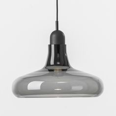 a gray light hanging from the ceiling