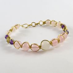 Pink Amethyst Bracelets For Healing, Pink Amethyst Healing Bracelets, Purple Rose Quartz Round Beads Jewelry, Purple Rose Quartz Beads Jewelry, Pink Amethyst Healing Bracelet, Adjustable Rose Quartz Jewelry With Stones, Pink Amethyst Natural Stone Bracelets, Pink Amethyst Crystal Bracelet For Healing, Pink Amethyst Gemstone Beaded Bracelets