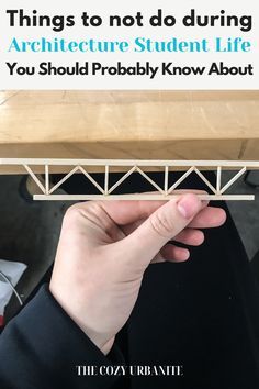 someone is holding up a miniature bridge with the words things to do during architecture student life you should probably know about