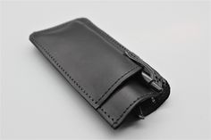 "Black Leather Sunglass Case | Leather Glasses Case | Sunglass Eyewear Glasses Cover | Sunglasses Case | Custom Glasses Case Check out these durable handcrafted glasses cases! Created from single piece of premium French calfskin, each case is carefully stitched together with the greatest attention to detail. The cases measure 3\" wide, and 6\" tall...the perfect size for nearly all reading glasses (also works well for most sunglasses.) On front of the case is another pocket, for conveniently car Black Cases With Pen Holders For Gifts, Leather Wallets With Rectangular Case For Gift, Leather Rectangular Wallet, Modern Leather Cases For Personal Use, Leather Sunglass Case, Gifts For Men Birthday, Custom Glasses, Leather Bible, Leather Anniversary Gift