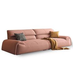 a pink couch with pillows on it and a throw pillow in the corner next to it