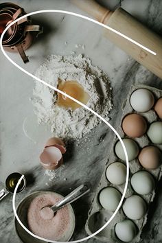 an image of eggs and flour on a table