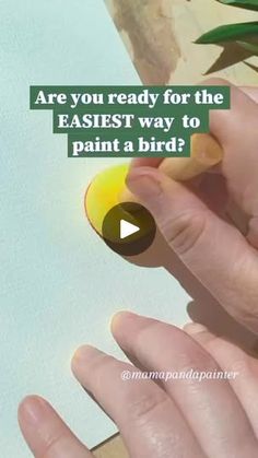 two hands are holding an object with the words are you ready for the fastest way to paint a bird?