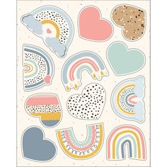 an assortment of stickers with hearts, rainbows and clouds in pastel colors