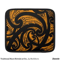 an orange and black abstract design on a laptop sleeve