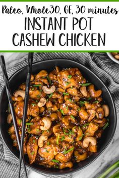 chicken with cashews and mushrooms in a bowl with chopsticks on the side