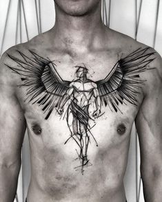 a man's chest with an angel tattoo on it