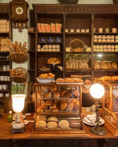 a bakery filled with lots of bread and pastries