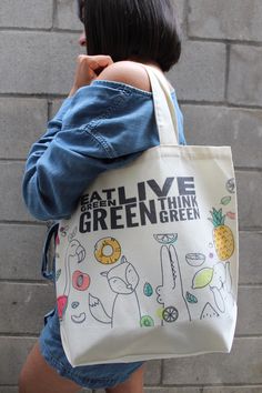 "Strong and stylish tote bags with inspirational designs and quotes! Size: 15.5\"x13.5\"x 5\" Care: Please Hand wash in cold water and gentle soap, air dry." Green Tote Bag With Eco-friendly Ink, Eco-friendly Green Bags With Letter Print, Eco-friendly Green Bag With Letter Print, Eco Christmas Gifts, Eat Green, Kraft Paper Wrapping, Painted Tote, Brand Stickers, Market Bags