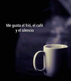 a white coffee cup sitting on top of a table next to a black background with the words, me gusta el frio, el cafe y el silencio