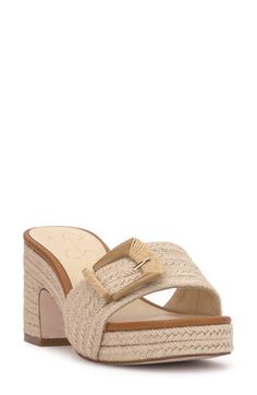 An oversized buckle details the vamp of an espadrille-inspired slide sandal lifted by a jute-wrapped platform and block heel. 3" heel; 3/4" platform Textile upper/synthetic lining/rubber sole Imported Beige Summer Mules With Heel Strap, Summer Espadrille Wedge Sandals With Buckle Closure, Spring Espadrille Wedge Sandals With Buckle, Beige Sandals With Tang Buckle For Spring, Straw Open Toe Wedge Sandals With Buckle Closure, Summer Espadrilles With Buckle Closure And Wedge Heel, Vacation Espadrilles With Buckle Closure, Straw Wedge Sandals With Buckle Closure For Summer, Summer Straw Wedge Sandals With Buckle Closure