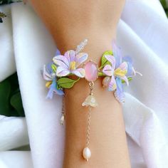 Introducing our Chinese vintage style flower bracelet that's made in silk. Originated from the traditional Chinese Hanfu accessories, the entire bracelet, including the band and the flowers are delicately embroidered with high quality silk. The elegant morning glory and lily of the valley design makes the bracelet so unique and elegant, with the pearls together give the jewelry a fresh and unique feeling. ✈️ Handling & Shipping usually takes about 10 days in total, so please consider the process Handmade Bracelets For Wedding In Spring, Handmade Bracelets For Spring Weddings, Chinese Stair Case Bracelet, Chinese Friendship Bracelet, Hanfu Embroidery, Lily Of The Valley Design, Lunar New Year Gift, Chinese Gold Bracelet, Hanfu Accessories