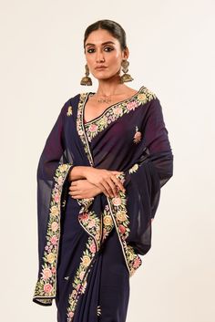 Discover the timeless elegance of our Navy Blue Parsi Gara Saree. Perfect for women whoappreciate traditional craftsmanship and sophisticated style. Shop now and elevate yourwardrobe. Traditional Pre-draped Wedding Saree With Floral Embroidery, Blue Embroidered Pre-draped Saree For Transitional Season, Transitional Floral Embroidered Pre-draped Saree, Traditional Blue Pre-draped Saree With Floral Embroidery, Elegant Pre-draped Saree With Floral Embroidery For Eid, Transitional Blue Georgette Blouse Piece, Elegant Floral Embroidered Pre-draped Saree For Eid, Traditional Embroidered Pre-draped Saree For Formal Occasions, Traditional Blue Pre-draped Saree With Resham Embroidery