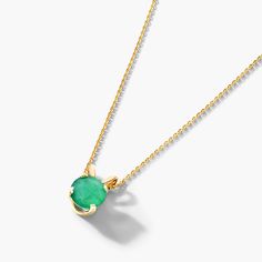 14K Yellow Gold Emerald Birthstone Necklace. The birthstone of May, Emeralds are said to protect against evil and bring true love, passion and loyalty to those who wear it. This vibrant emerald pendant is the perfect piece for your special someone. Green Gemstone Birthstone Necklace With Round Pendant, Green Gemstone Round Pendant Birthstone Necklace, Gold Tsavorite Emerald Necklace For May Birthstone, Emerald Pendant Necklace With Gemstone Accents As Gift, Emerald Pendant Birthstone Necklace In Yellow Gold, Yellow Gold Emerald Pendant Birthstone Necklace, Yellow Gold Emerald Pendant Necklace With Prong Setting, Yellow Gold Emerald Necklace With Tsavorite, Tsavorite Emerald Necklace In Yellow Gold