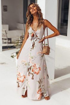 We're really into maxis at the moment and our Sounds Of Summer Maxi Dress has our hearts racing! This style has a tie front bust, adjustable shoulder straps and it buttons down the front. This style looks street style chic when layered over a white tee and paired with slides - our FAVES are the Dayla slides from BILLINI. Beige dress. Partially lined. Cold hand wash only. Model is a standard XS and is wearing XS. True to size. Non stretchy fabric. No zipper, button up style. Print placement may vary. Polyester. Button Dresses For Women, Áo Blu, Tennis Skirt Outfit, Maxi Dress Outfit, Dress Beige, Looks Street Style, Beige Dresses, Feather Dress, Summer Dress Outfits