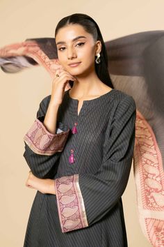 Brand: NishatCollection: Nishat Any Day Winter Unstitched CollectionFabric: Cotton DESIGN DETAILS: SHIRTPrinted Dobby Cotton Shirt: 3 MeterEmbroidered Motifs + BorderFabric: Dobby CottonColor: Black DUPATTADigital Printed Banarsi Slub Dupatta: 2.5 MeterFabric: Banarsi SlubColor: Black & Red TROUSERSSolid Dobby Cotton Trousers: 2.5 MeterFabric: Dobby CottonColor: Black DISCLAIMER:* Lining, Laces, and Tassels are not included in unstitched variants.* Embellishment items in stitched outfits are subject to market availability.* The actual colors of the outfit may vary from the colors being displayed on your device. CARE INSTRUCTIONS: Extra Fabric Has Been Used For Shoot Original Color May Vary Slightly From The Picture Dry Clean Recommended Iron The Clothes At Moderate Temperature Do Not Use B Unstitched Cotton Silk Palazzo Set, Unstitched Cotton Silk Sets, Semi-stitched Cotton Silk Sets, Eid Cotton Silk Sets With Printed Motifs, Cotton Silk Sets With Embroidered Border For Eid, Eid Cotton Silk Sets, Semi-stitched Lawn Suit With Embroidered Border, Elegant Unstitched Mulmul Suit With Embroidered Border, Embroidered Cotton Silk Unstitched Suit