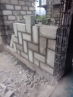 a building that is being built with concrete blocks