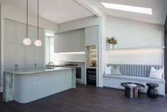 the kitchen is clean and ready to be used as a living room or dining area