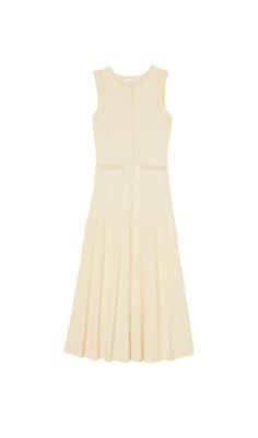 This versatile dress features a flattering sleeveless design and a comfortable knit fabric, perfect for any occasion. Transition effortlessly from day to night and feel confident and stylish all day long. Round neck Sleeveless Front beaded button closures Flared hem Lower main fabric: 80% viscose/20% polyamide; upper main fabric: 52% viscose/46% polyamide/2% elastane Hand wash or dry clean Colour may vary due to lighting on images. The product images (without model) are closest to the true colou Sleeveless Viscose Dresses For Fall, Fitted Sleeveless Midi Dress In Viscose, Elegant Knit Sleeveless Dress For Spring, Summer Knit Dresses For Work, Knit Summer Workwear Dresses, Summer Knit Workwear Dresses, Spring Viscose Fitted Sleeveless Dress, Spring Fitted Sleeveless Viscose Dress, Fitted Viscose Sleeveless Dress For Spring