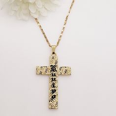 High Quality Gold Plated Hawaiian Kuuipo Scroll Cross Necklace. This Gold Plated Necklace Measures 21 Inches With A 3 Inch Extender Attached For Your Adjustment. You Can Easily Adjust The Necklace To Your Fitting Up To 24 Inches In Length. The Gold Chains Are Solid And Sturdy And Very Durable. They Are Gold Plated And Not Gold Filled Or Solid Gold. Black Engraved Cross Pendant Necklace, Personalized Black Cross Pendant Necklace, Black Cross Pendant Necklaces For Party, Black Cross Pendant Necklace For Party, Black Personalized Pendant Necklaces, Personalized Black Pendant Necklaces, Black Cross Pendant Necklace For Formal Occasions, Personalized Black Jewelry For Party, Elegant Black Personalized Necklace