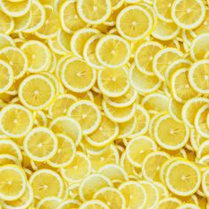 many slices of lemons are arranged in a large pattern on top of each other