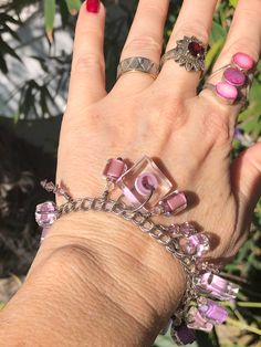 Vintage Murano glass Charms and beads geometric pink / purple bracelet and sterling silver chain link Pink Adjustable Chain Bracelet, Modern Purple Bracelet Jewelry, Pink Chain Bracelet Jewelry, Handmade Pink Glass Jewelry, Modern Purple Metal Jewelry, Pink Jewelry With Adjustable Round Beads Chain, Modern Purple Bracelet As Gift, Modern Purple Jewelry For Party, Modern Pink Jewelry For Party